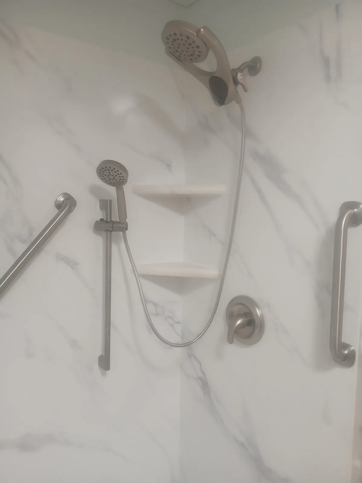 New shower valve trim, slide bar and handheld showerhead, by Thomas Plumbing & Construction